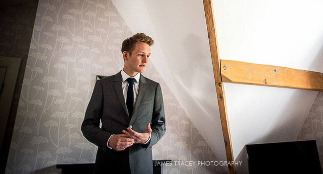 Groom in thought before wedding image by James Tracey Photography manchester gay wedding photographer 3 5