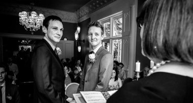 Grooms Listen To Celebrant At Their Manchester Gay Wedding Image By James Tracey Photography A Gay Wedding Photographer In Manchester Via The Gay Wedding Guide 3 5 380X204