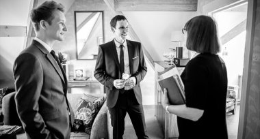Grooms Talk To Celebrant Ahead Of Their Gay Wedding In Manchester Image By James Tracey Photography A Gay Wedding Photographer In Manchester Via The Gay Wedding Guide 3 5 380X204