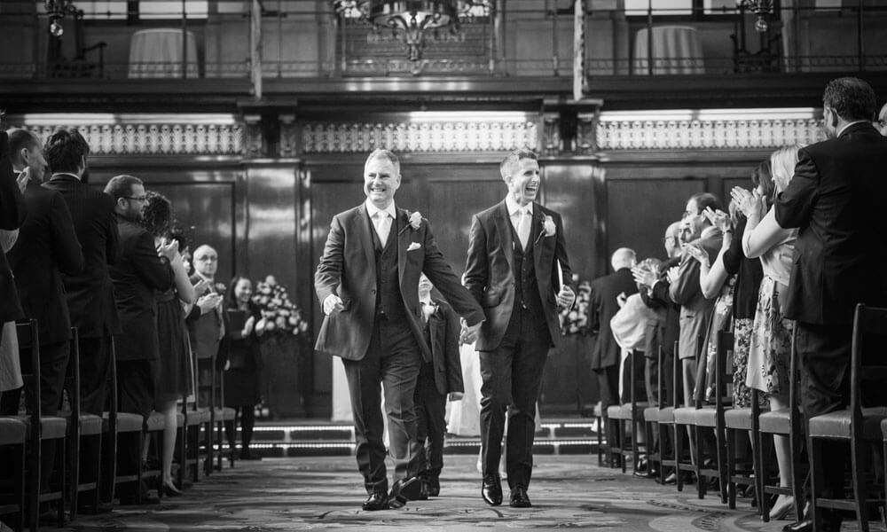 Groosm just married Gareth and Paul at Merchant Taylors Hall London image by Emir Hasham via the Gay Wedding Guide 1 5