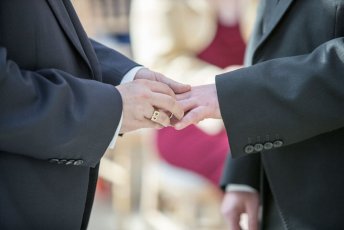 Guy And Mark Exchange Rings At Their Gay Wedding Barn Wedding Venue Gaynes Park Image Copyright Steve Hobart Photography Via The Gay Wedding Guide 1 5 344X230
