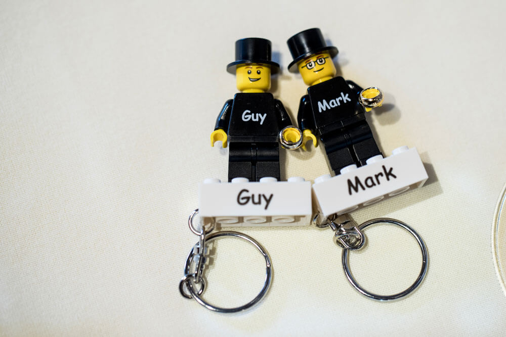 Guy and Marks personalised lego keyrings at their gay wedding Gaynes Park Essex barn wedding venue image copyright Steve Hobart Photography via the gay wedding guide 1 5