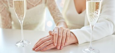 Hands Of Lesbian Couple At Beach Weddings Bournemouth Gay Wedding Guide Image Copyright Anna Morgan Photography 9 380X174