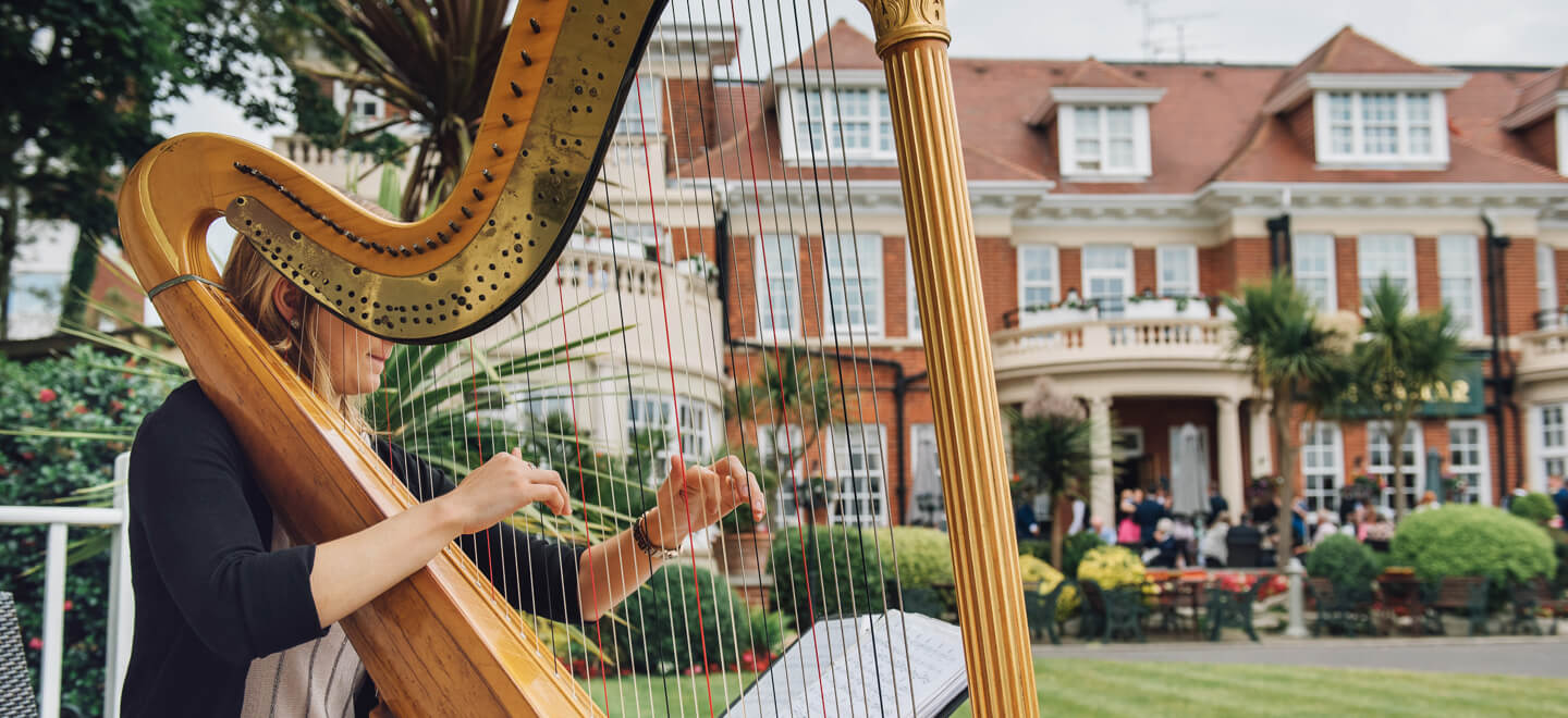 Harpist in front of wedding ceremony Bournemouth Hotel Miramar gay wedding venue guide 9