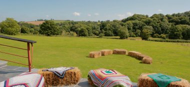 Hayne Barn Hay Bales With Blankets At Wedding Venue Devon Gay Wedding Guide 9 380X174