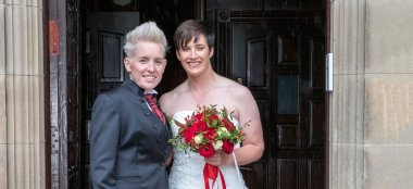 Kat And Ali Pose For Camera At Their Lesbian Wedding Photographer This World Wedding Photography Via Gay Wedding Guide 6 380X174