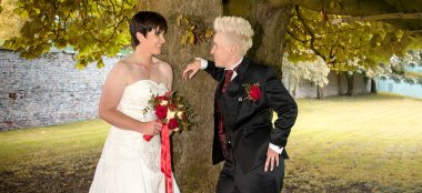 Kat And Ali Stand By Tree At Their Lesbian Wedding Photographer This World Wedding Photography Via Gay Wedding Guide 6 380X174