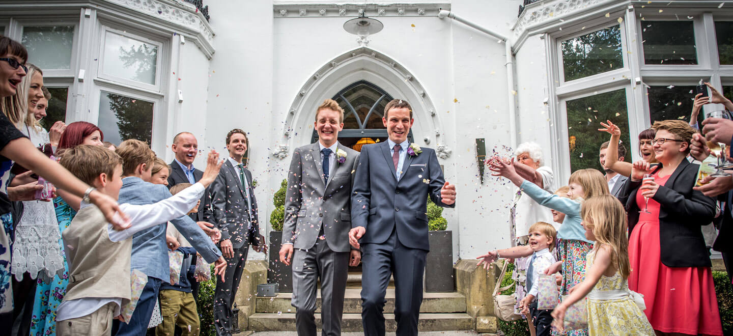 Kenny and Richard showered by confetti by James Tracey gay wedding photography via the gay wedding guide 4