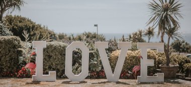 Love Light Sign At Beach Wedding Venue Bournemouth Hotel Miramar Gay Wedding Venue Guide 9 380X174