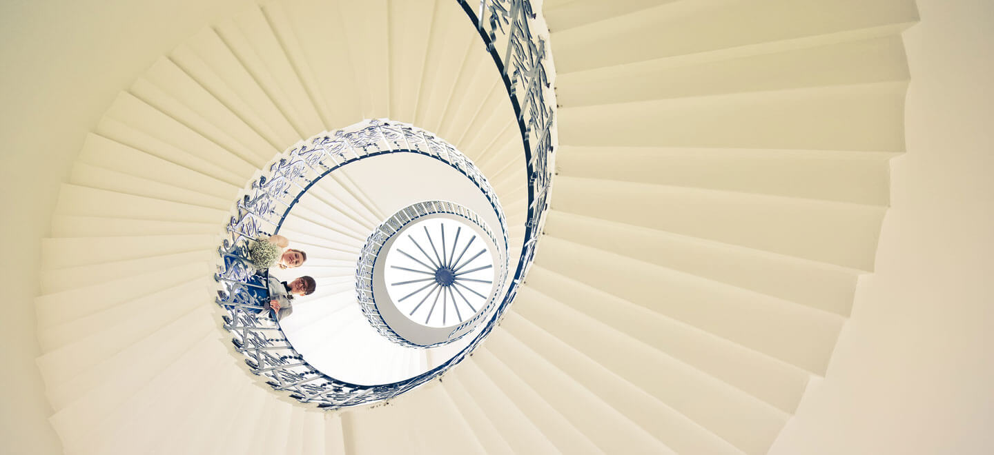Lesbian Brides on spiral stairs by Lesbian wedding photography Daria Nova Photography via Gay Wedding Guide 6