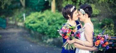 Lesbian Brides Spring Wedding Cuddle By Lesbian Wedding Photography Daria Nova Photography Via Gay Wedding Guide 6 380X174