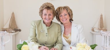 Lesbian Couple Sign The Register At Beach Weddings Bournemouth Gay Wedding Guide Image Copyright Anna Morgan Photography 9 380X174