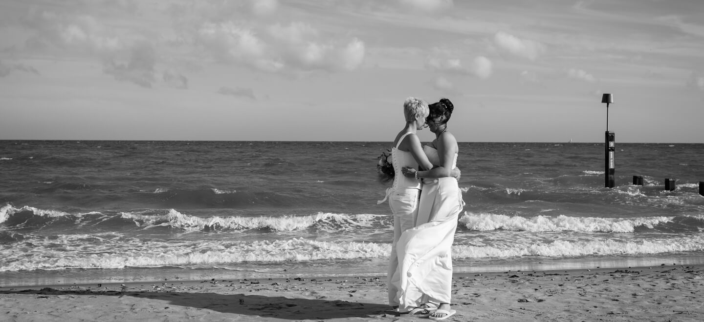 Lesbian Couple on beach at Beach Weddings Bournemouth Gay Wedding Guide image copyright Anna Morgan Photography 9