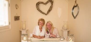 Lesbian Couple Sign Register At Beach Weddings Bournemouth Gay Wedding Guide 9 380X174
