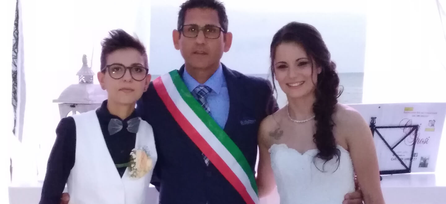 Lesbian brides at their lesbian wedding with gay wedding celebrant italy Tonigar Ceremony by Antonino via Gay Wedding Guide 6