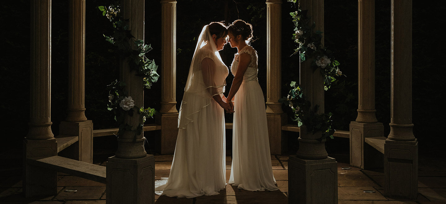 Lesbian brides silhouette at night photograph by Paul Walker Photographer Gay Wedding Guide 6