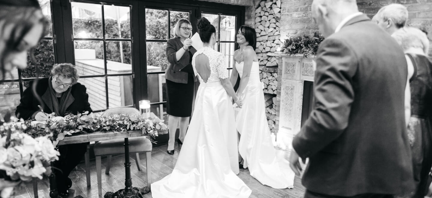 Lesbian brides wearing wedding dress by lisa Lyons Bridal lesbian weddings gay wedding guide 6