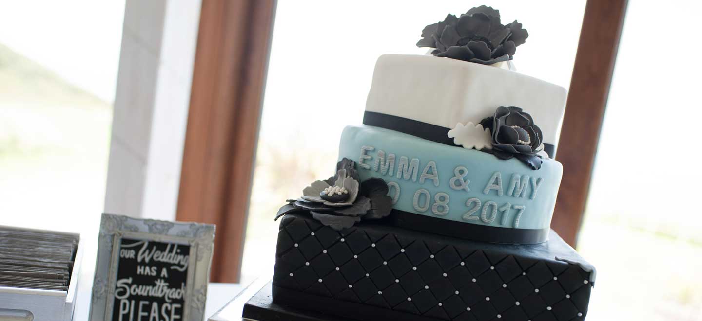 Lesbian wedding cake of emma and amy at ocean kave image by MrsJutsonPhotography 1 1 5
