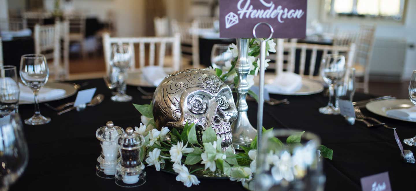 Lesbian wedding table centrepiece skull of emma and amy at ocean kave image by MargoRphotography 1 1 5