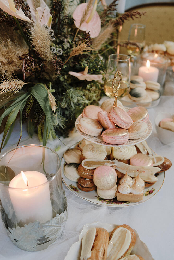 Macaroons and sweet table at Swan Lake wedding shoot styled via Gay Wedding Guide 8