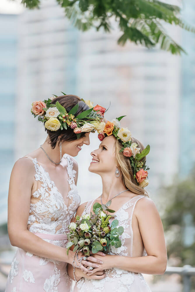 Megan and Fiona look at each other at their lesbian wedding australia shoot via Brisbane City Celebrants Elysia and the gay wedding guide 6
