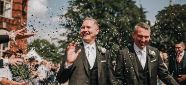 New Gay Couple Under Confetti At The Elvetham Hotel Wedding Venue Hampshire Gay Wedding Guide Image Rivendell Studio 9 380X174