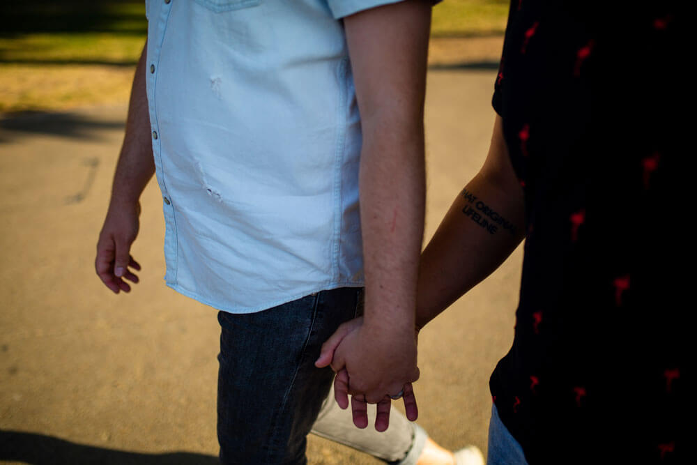 Neill Iggy hold hands during Gay Engagement shoot on London Southbank image by Engagement Chapter via Gay Wedding Guide 1 4