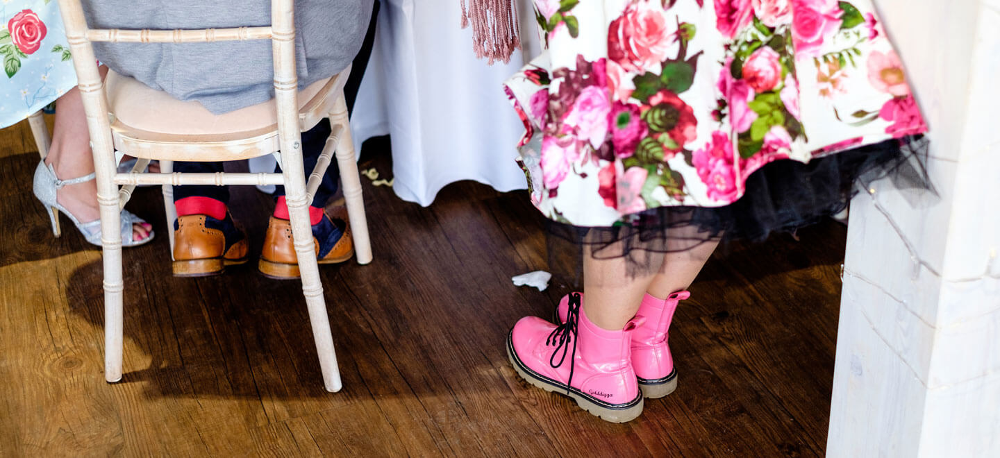 Pink DMs at Emily Jodie lesbian wedding Devon at Ocean Kave copyright Michael Wells via the Gay Wedding Guide 3 5