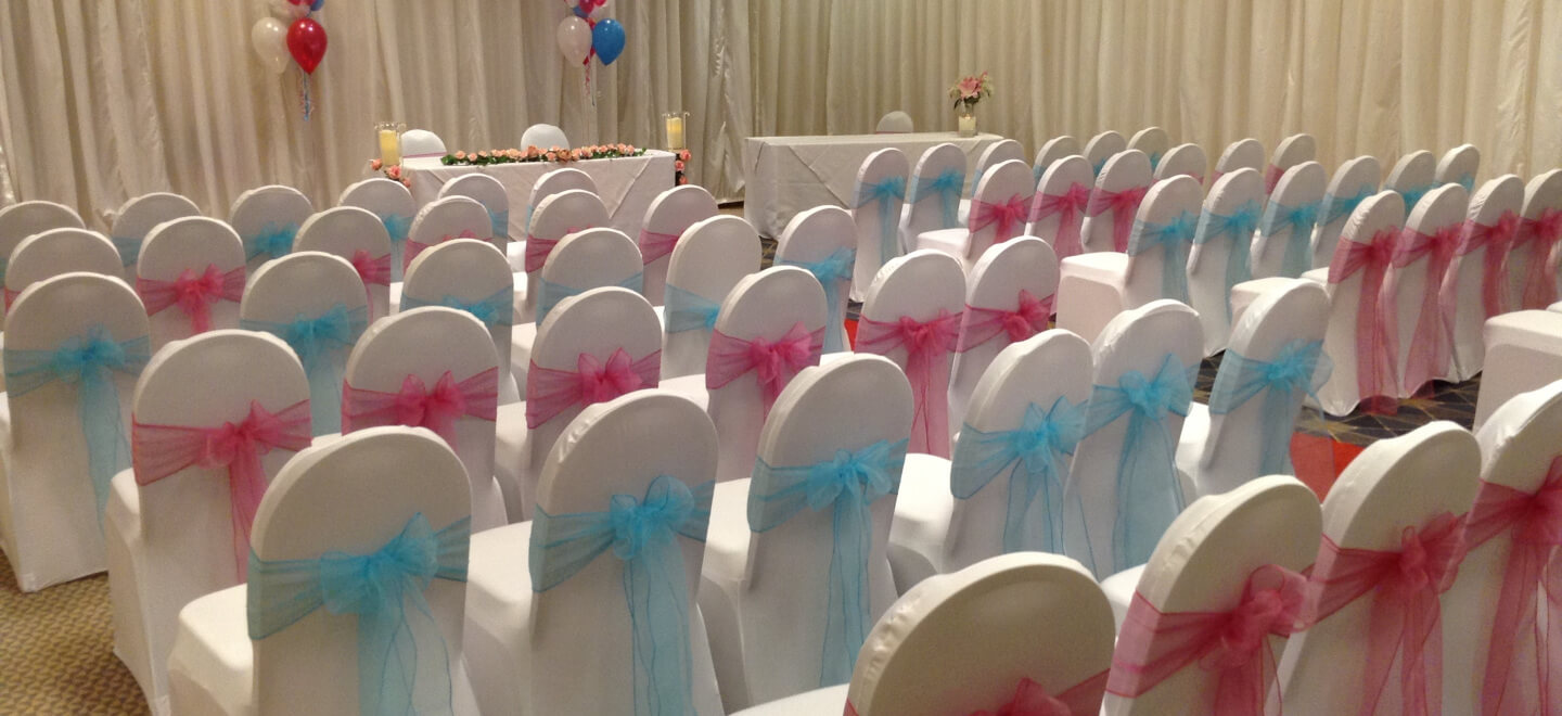 Pink and blue chairs at Alexandra House country house wedding wiltshire gay wedding guide 9