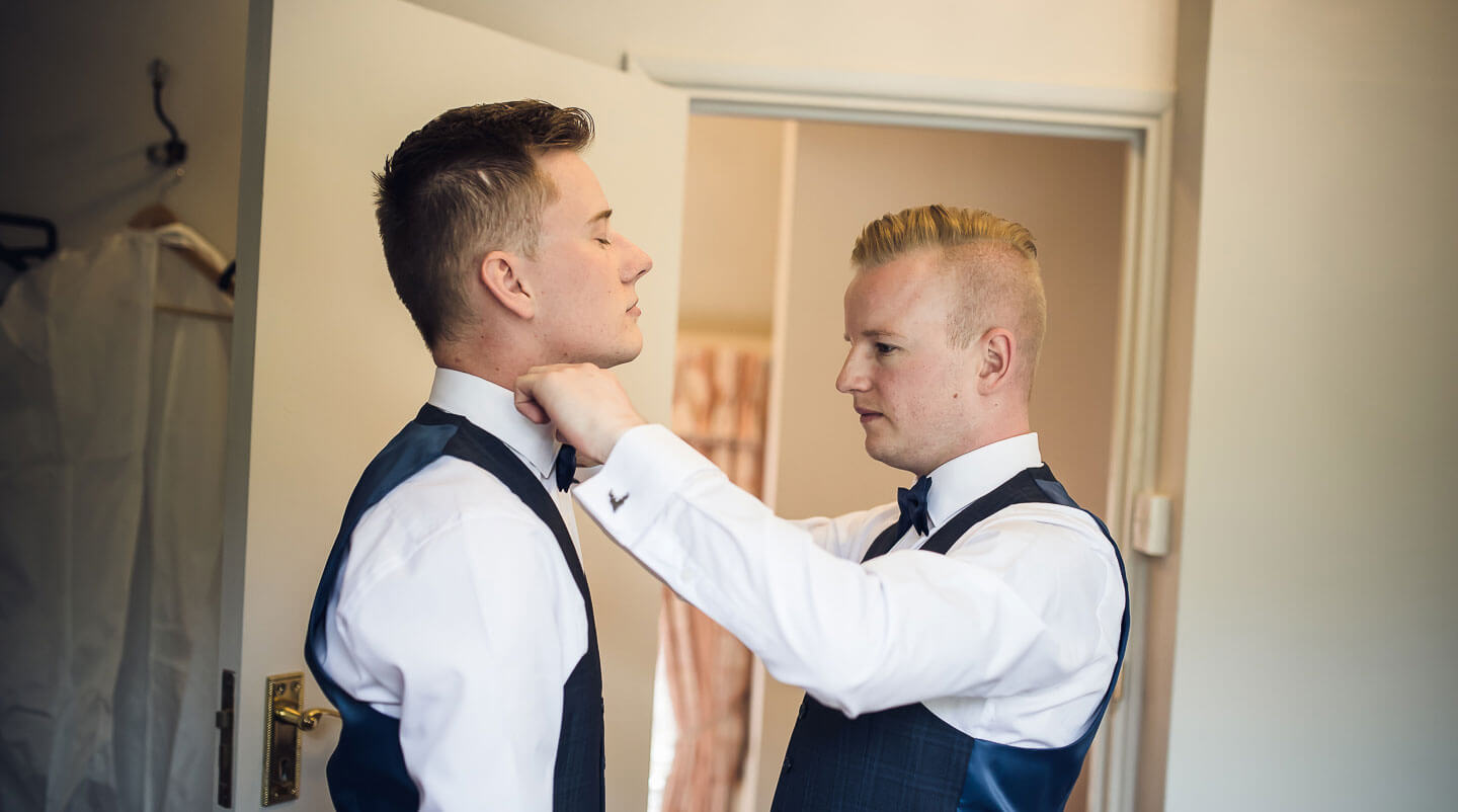 Sam and Kyle get ready for their gay wedding image copyright Shooting Pixels featured on The Gay Wedding Guide 3 5