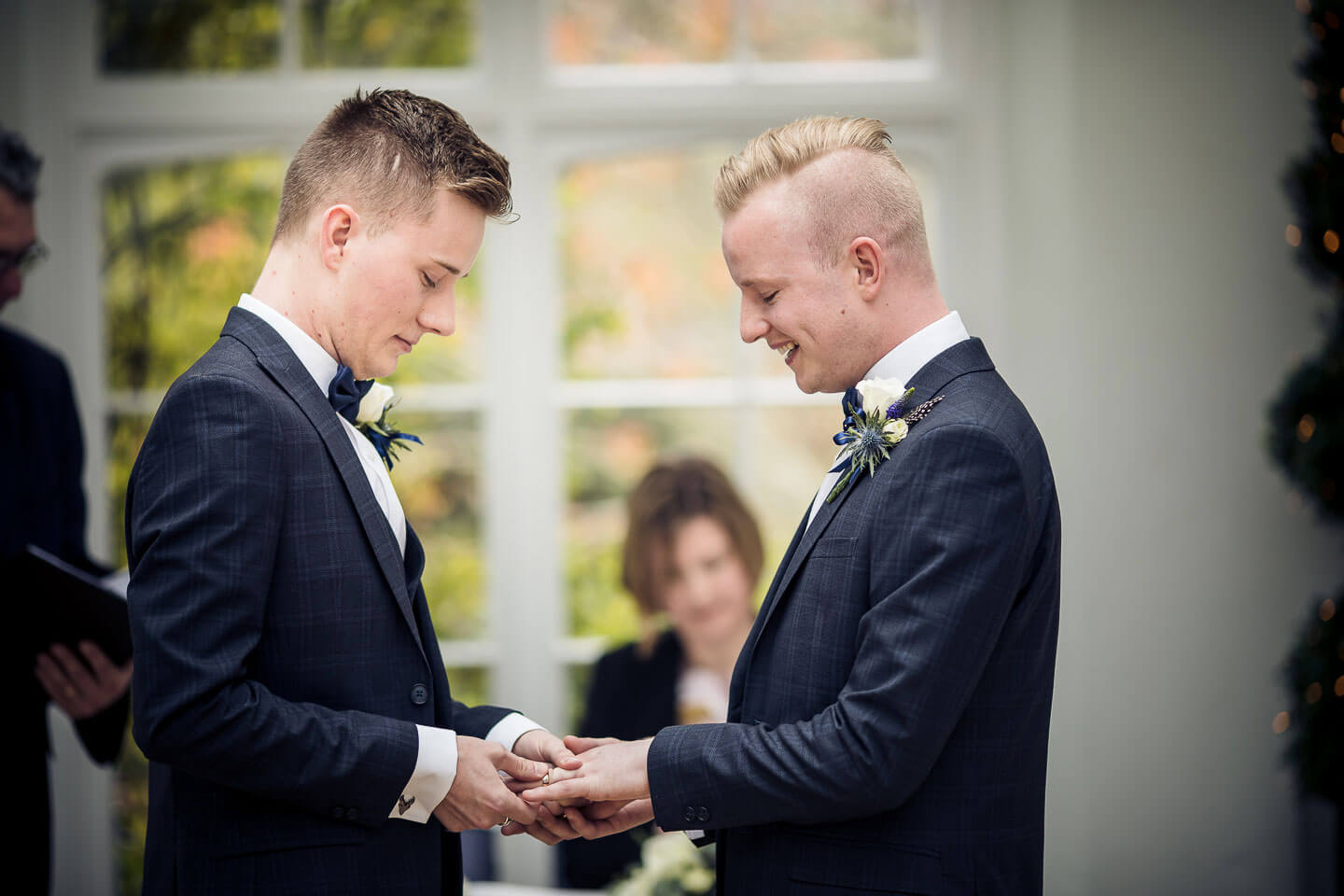 Sam and Kyles gay wedding photos ring exchange image copyright Shooting Pixels featured on The Gay Wedding Guide 3 5