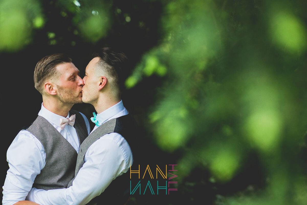 Scott and Guy kiss at their real gay wedding image copyright Hannah Hall Photography via The Gay Wedding Guide 3 5