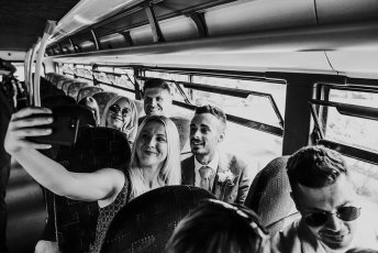 Selfie On Bus At Lee And Simon Gay Wedding At Bombay Sapphire Distillery Gay Wedding Guide Image By This And That Photography 1 5 344X230