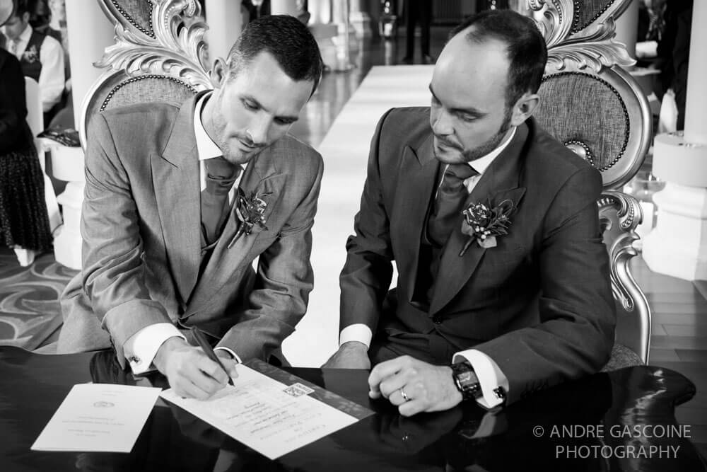 Signing the register Phil and Leo at their gay wedding in surrye image copyright Andre Gascoine via the Gay Wedding Guide 3 5
