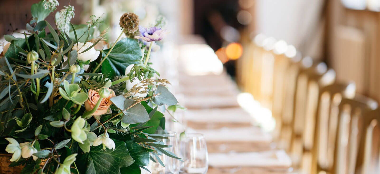 Table Flowers at Burley Manor Gay Wedding Venue in Hampshire via the gay Wedding Guide 9