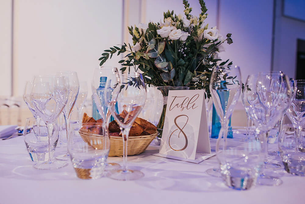 Table decor at Lee and Simon Gay wedding at Bombay Sapphire Distillery Gay Wedding Guide image by This and That Photography 1 5