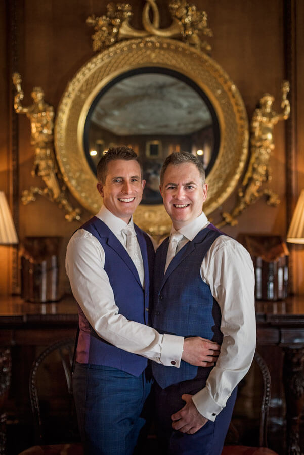 The grooms at the real gay weddings of Gareth and Paul at Merchant Taylors Hall London image by Emir Hasham via the Gay Wedding Guide 1 5