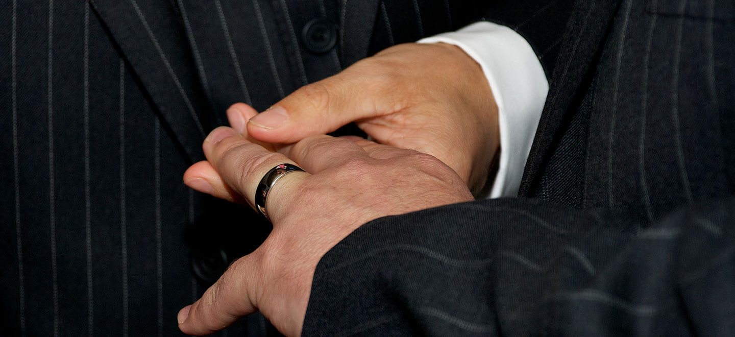 Two Grooms Holding Hands Gay Wedding Rings Image by Tony Hall Gay Wedding Photographer Yorkshire 6