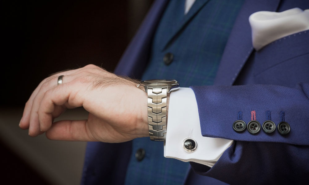 Watch and cufflinks of Gareth and Paul at Merchant Taylors Hall London image by Emir Hasham via the Gay Wedding Guide 1 5
