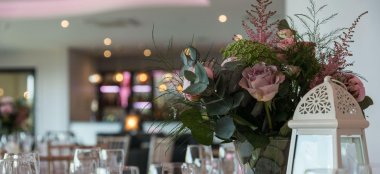 Wedding Flowers On A Table At Sandy Beach Hotel Beach Wedding Venue Devon Gay Wedding Guide 9 380X174