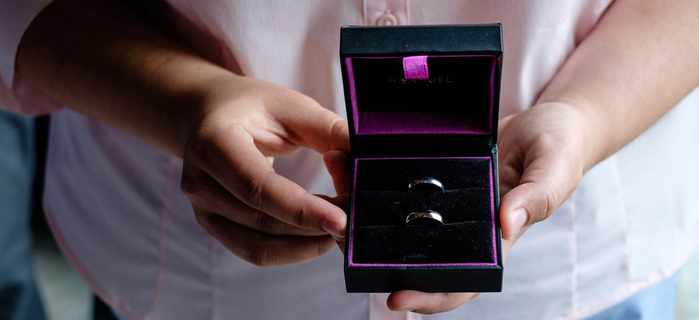 Wedding rings in box at Emily Jodie lesbian wedding Devon at Ocean Kave copyright Michael Wells via the Gay Wedding Guide 3 5