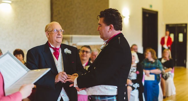 With this ring Vince and George wed at their pink wedding Berkshire photographed by gay wedding photographer Benjamin Stuart Photography 5