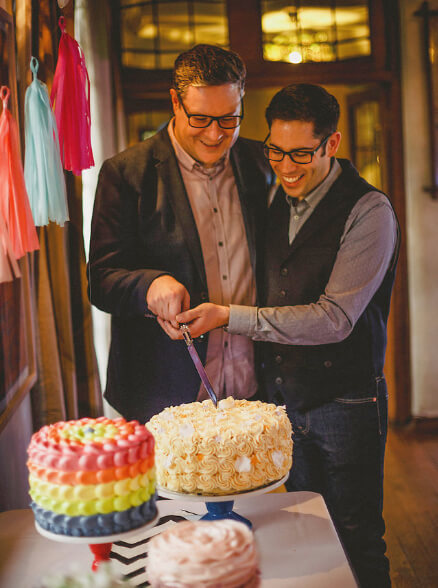 ant and marc cut their cakes at their gay wedding image copyright howell jones photography via gay wedding guide 1 5
