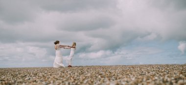 Beach Wedding Norfolk Celebrant Same Sex Wedding Lesbian Wedding Image By Luis Holden Photography 6 380X174