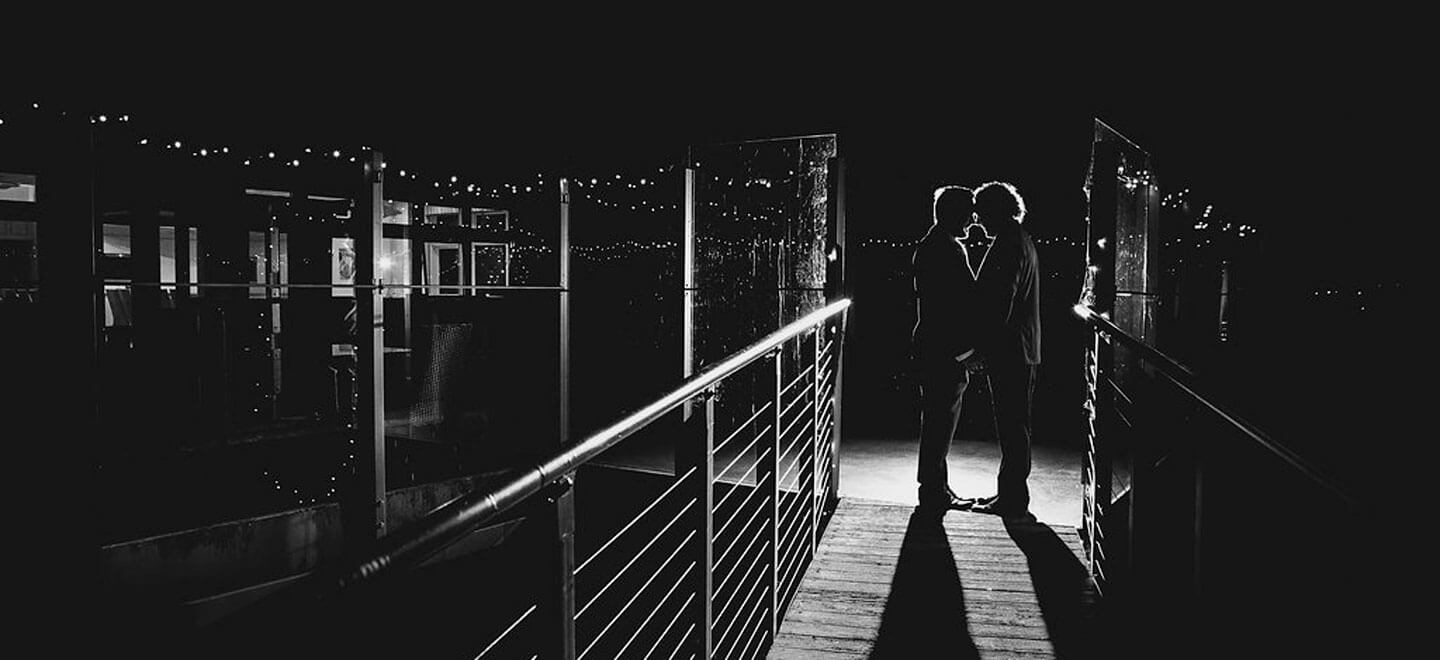 black and white holding hands Real Gay Wedding of Shaun and Carl via The Gay Wedding Guide images by Ross Willsher 3 5