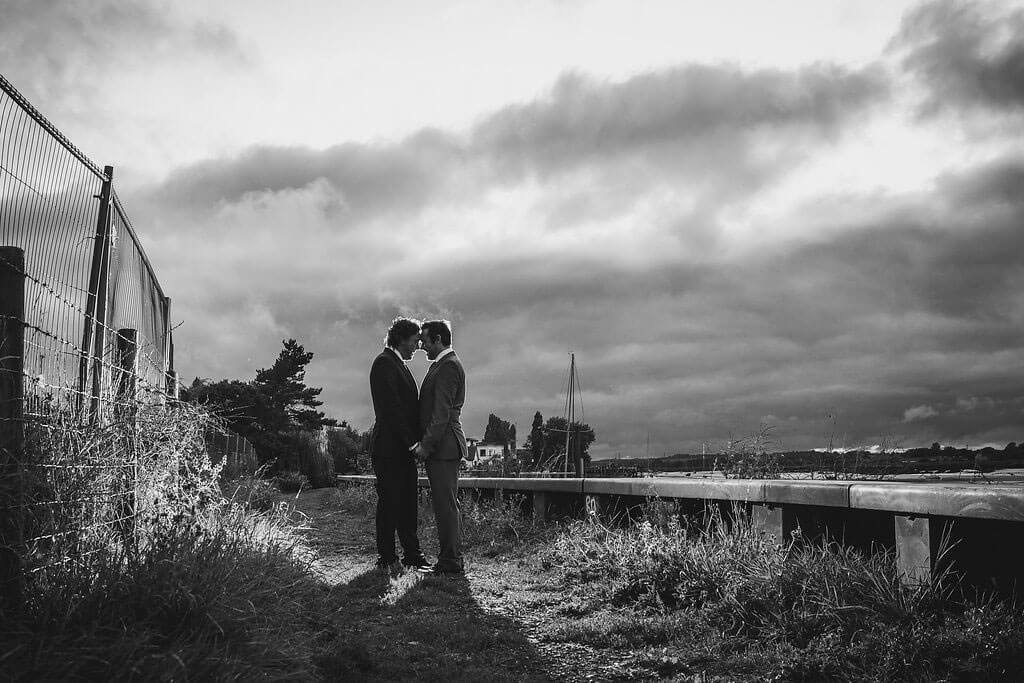 black and white near docks Real Gay Wedding of Shaun and Carl via The Gay Wedding Guide images by Ross Willsher 3 5