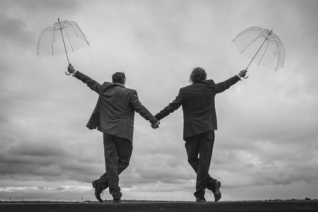 black and white umbrellas Real Gay Wedding of Shaun and Carl via The Gay Wedding Guide images by Ross Willsher 3 5