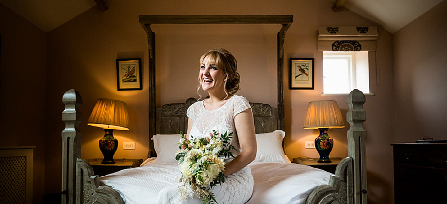 bride on bed atTelfit Farm wedding venue Yorkshire Gay Wedding Guide 9