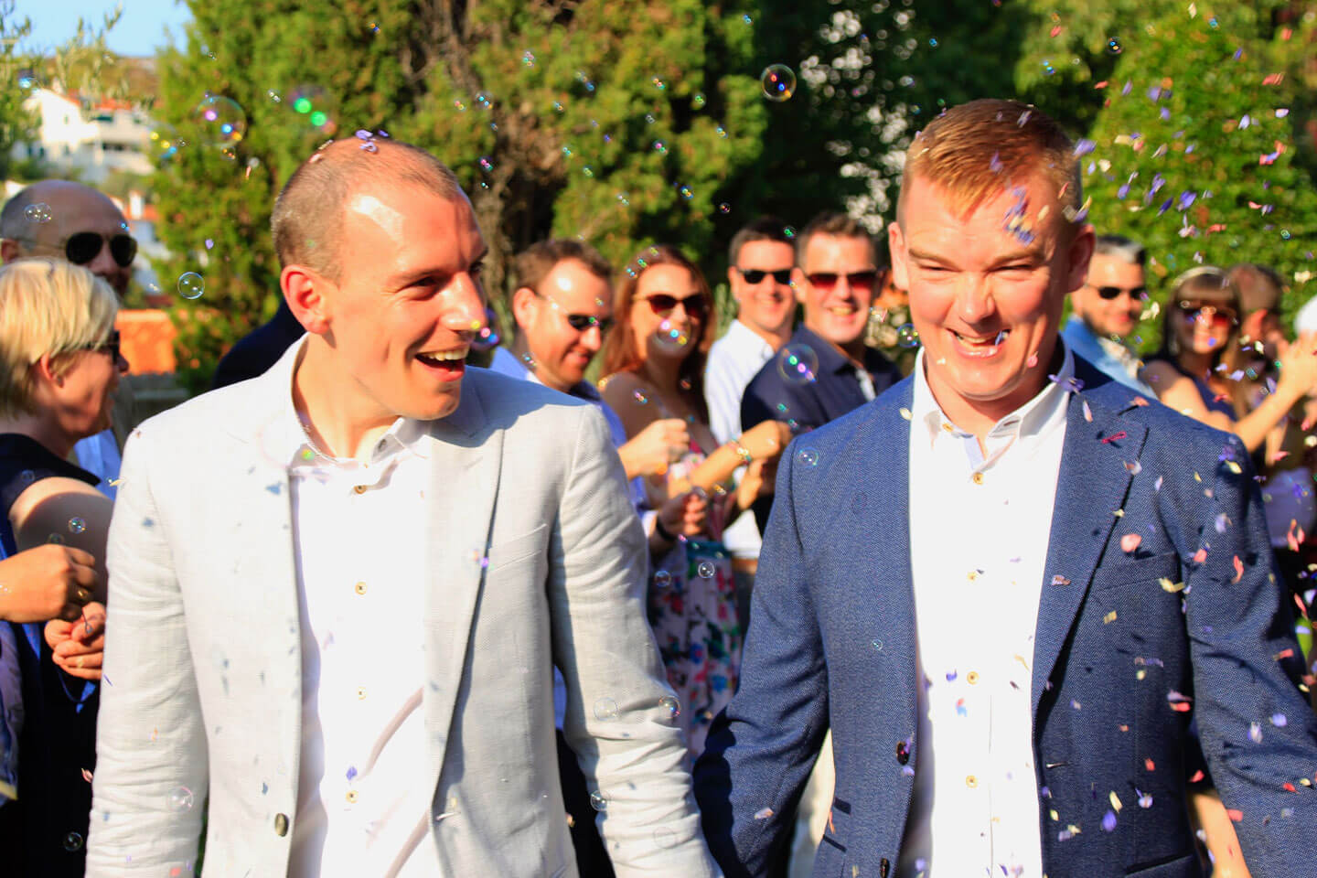 bubbles and confetti at Nick and Toms real gay wedding croatia via The Gay Wedding Guide 1 5