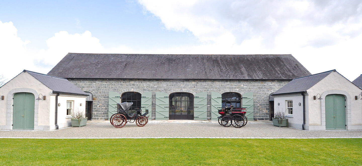 courtyyard with carriages setting at wedding venue ballynahinch the Carriage Rooms a barn wedding co down 9